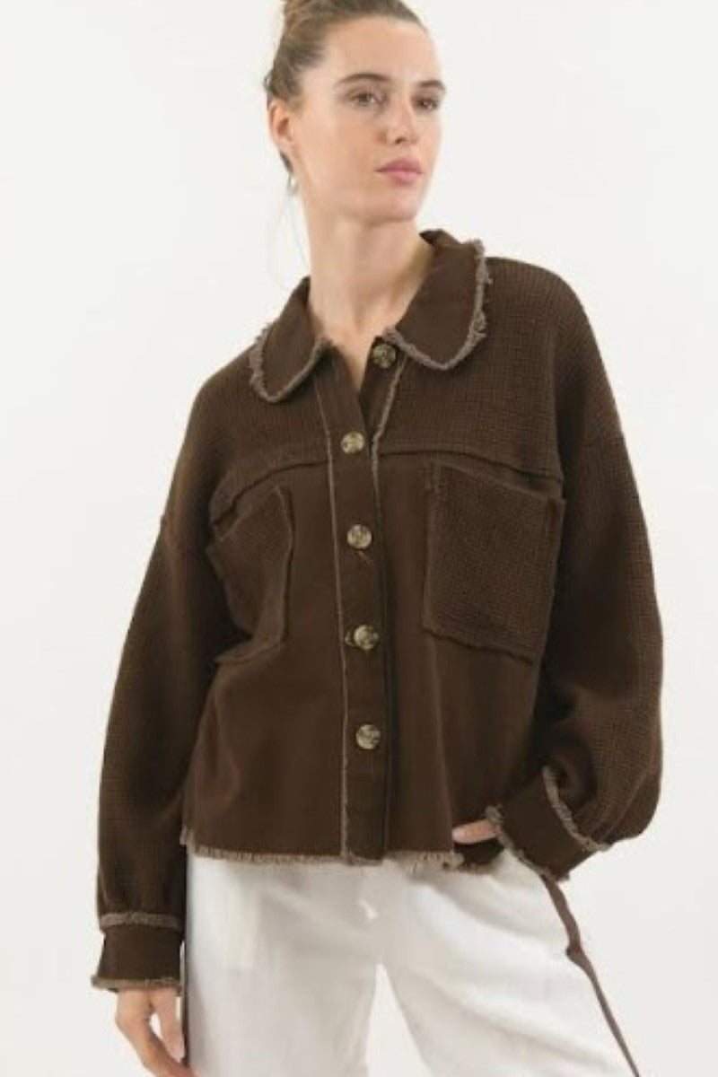 Front view of the Clara Jacket in Chocolate from Ivy Vibe, featuring a structured yet relaxed fit with button-down front, chest pockets, and soft textured fabric.