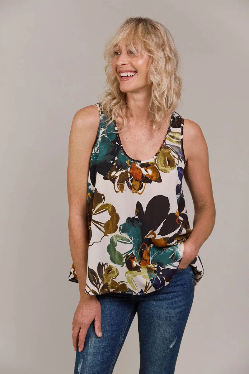 Close-up of Elsie Tank in botanical tusk print, highlighting the fabric texture and vibrant pattern, from Ivy Vibe Boutique.