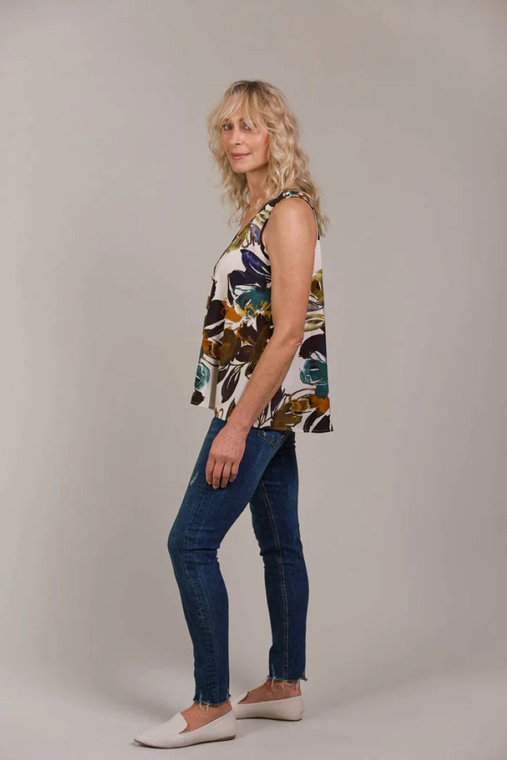 Side view of Elsie Tank in botanical tusk print, showcasing the sleeveless cut and relaxed fit, from Ivy Vibe Boutique.