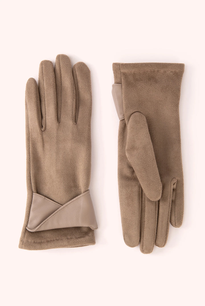 Pair of brown gloves on a white background
