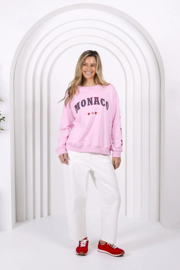 Front view of the MJ Sweat in Pink from Ivy Vibe, featuring a relaxed fit, long sleeves, and subtle Monaco print on soft, textured fabric.