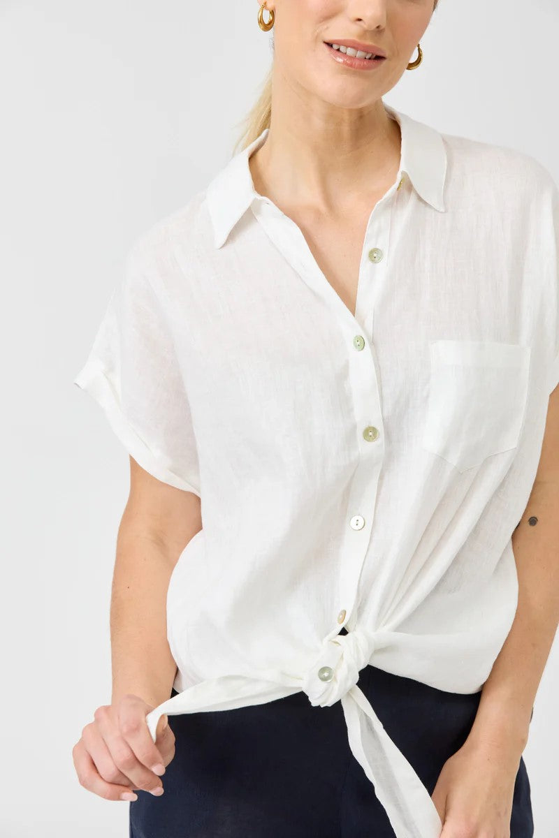 Close-up of Studio Tie Shirt in salt color, highlighting fabric texture and tied front detail, from Ivy Vibe Boutique.