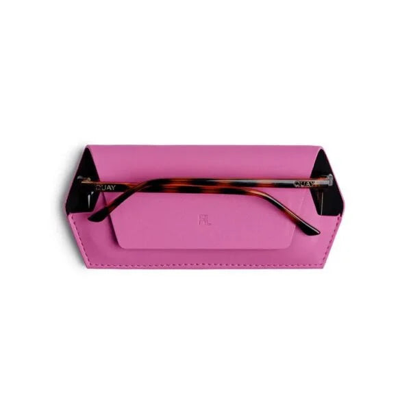 Pink eyeglass case with a pair of tortoiseshell-framed glasses on a white background