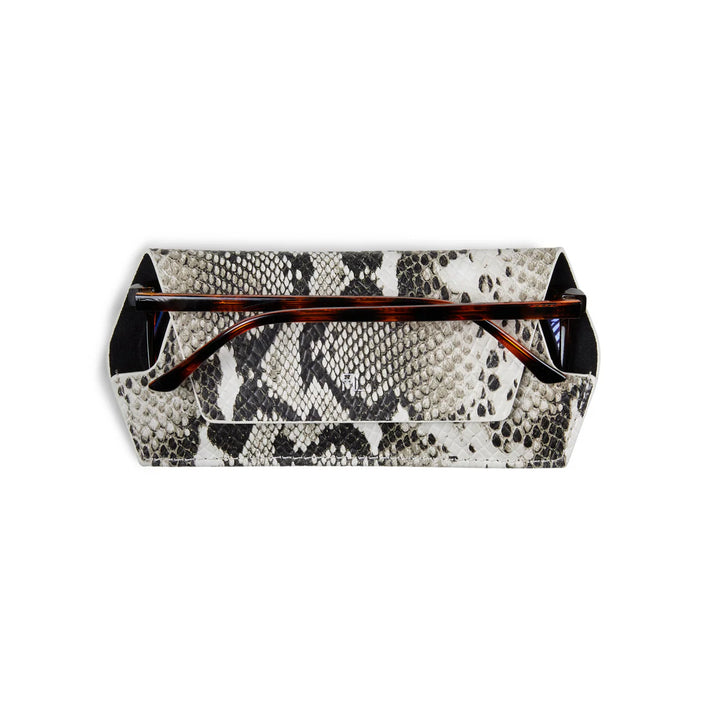 Snakeskin patterned clutch bag with tortoiseshell accents on a white background