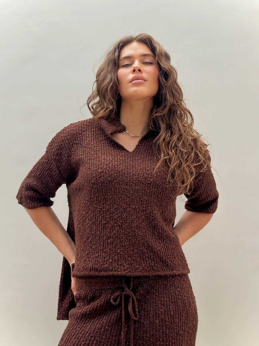 Close-up of textured brown knit lounge top and drawstring waist.