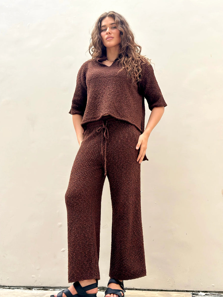 Front view of brown knit short-sleeve top and pants set.