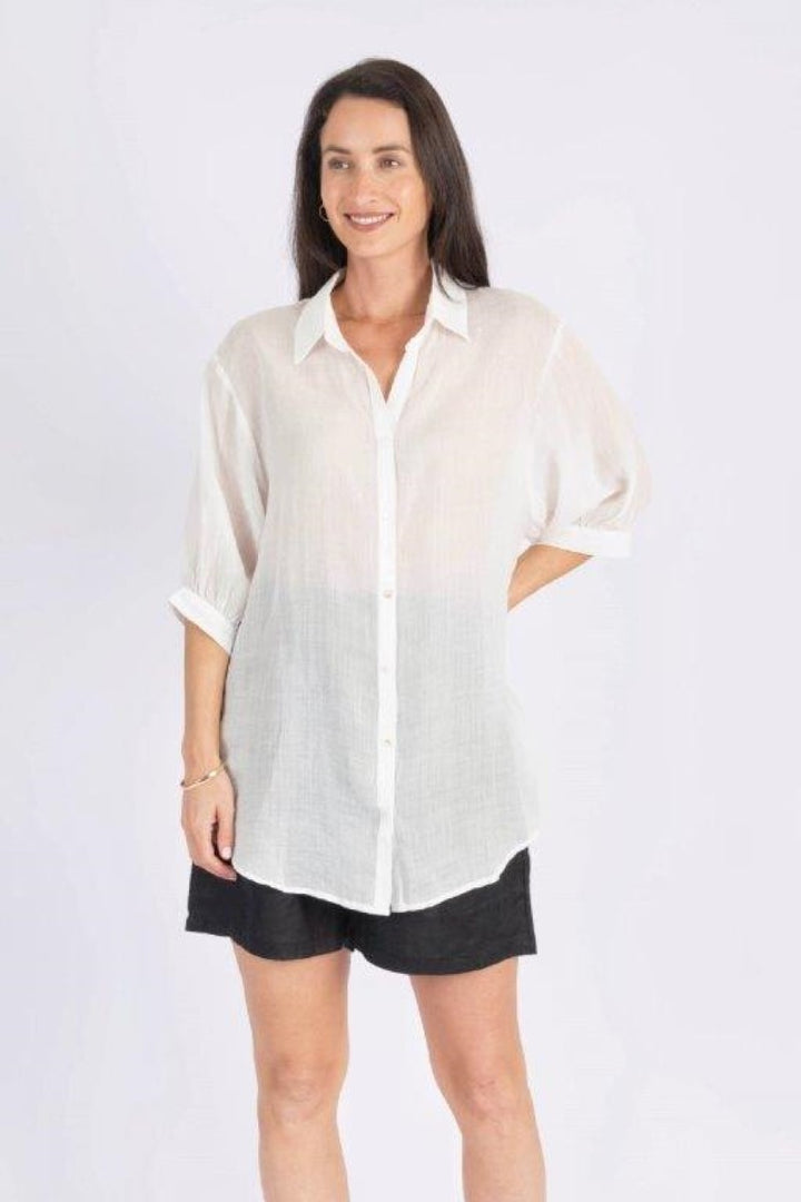 Front view of Ivy Vibe Athena Top in white – lightweight blouse with V-neckline, flutter sleeves, and relaxed fit