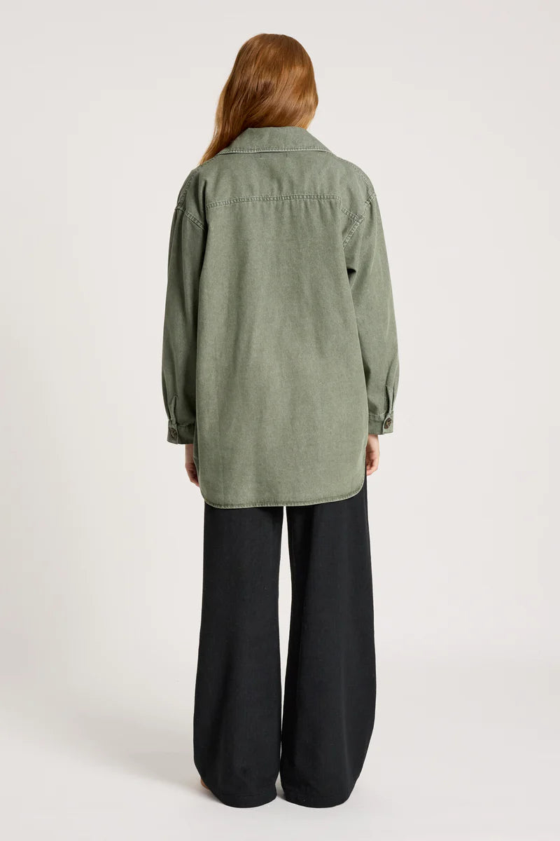 woman wearing Bodhi Denim Jacket in Olive