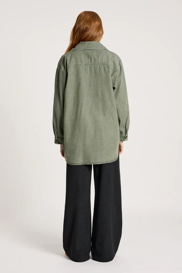woman wearing Bodhi Denim Jacket in Olive