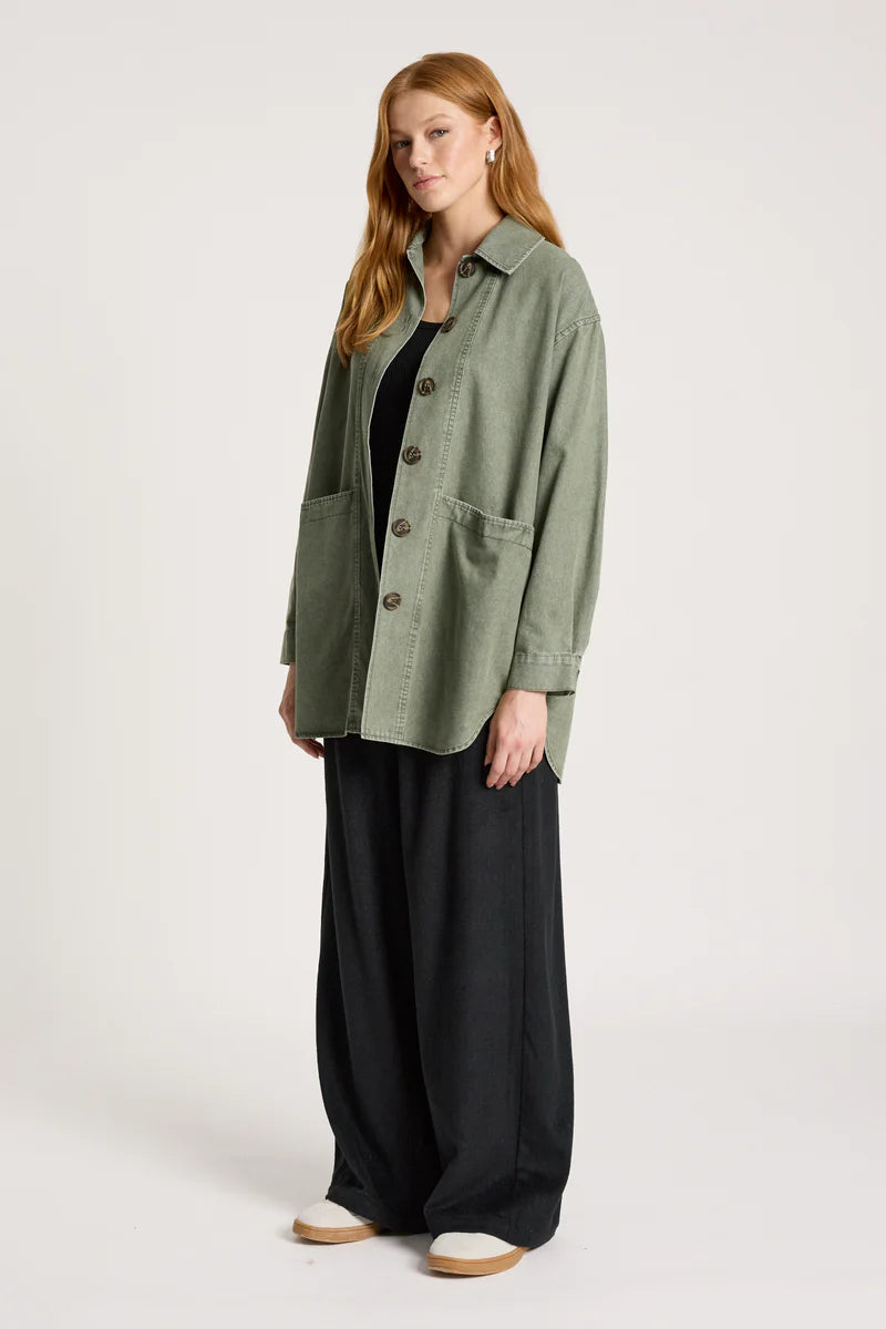 woman wearing Bodhi Denim Jacket in Olive