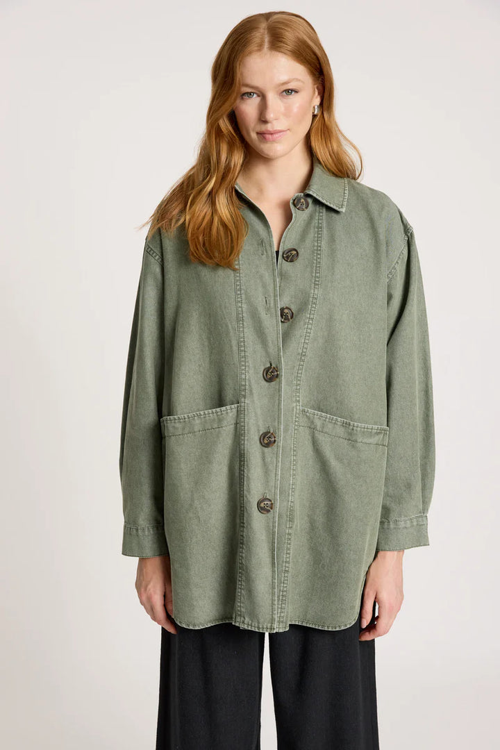 woman wearing Bodhi Denim Jacket in Olive