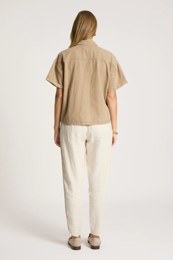 woman wearing Bodhi Denim Shirt in Fawn