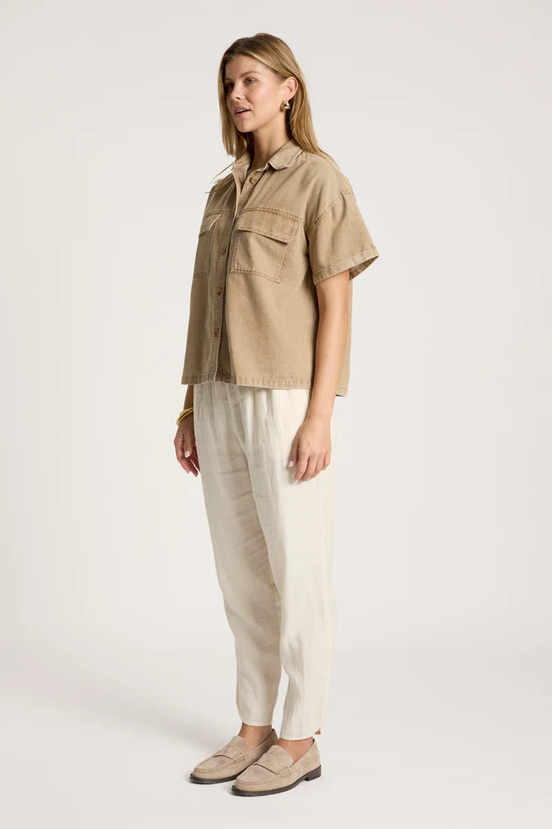 woman wearing Bodhi Denim Shirt in Fawn