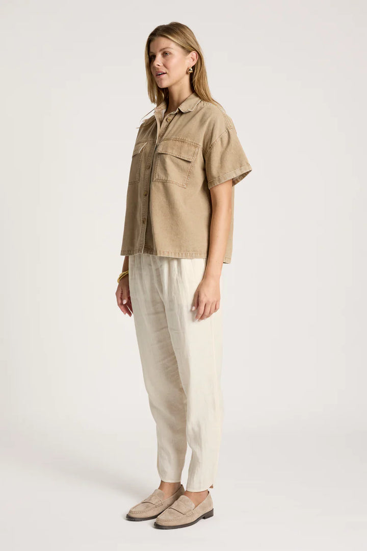 woman wearing Bodhi Denim Shirt in Fawn