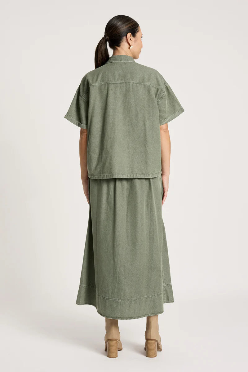 woman wearing Bodhi Denim Shirt in Olive