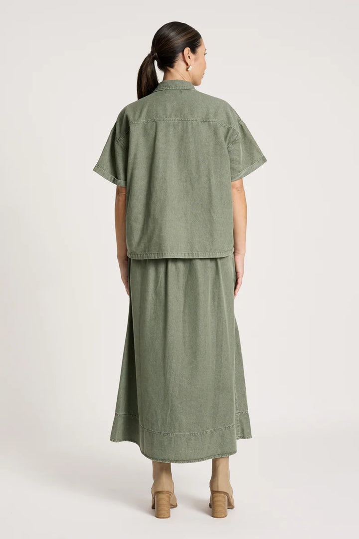 woman wearing Bodhi Denim Shirt in Olive