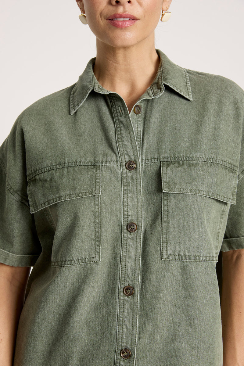 woman wearing Bodhi Denim Shirt in Olive