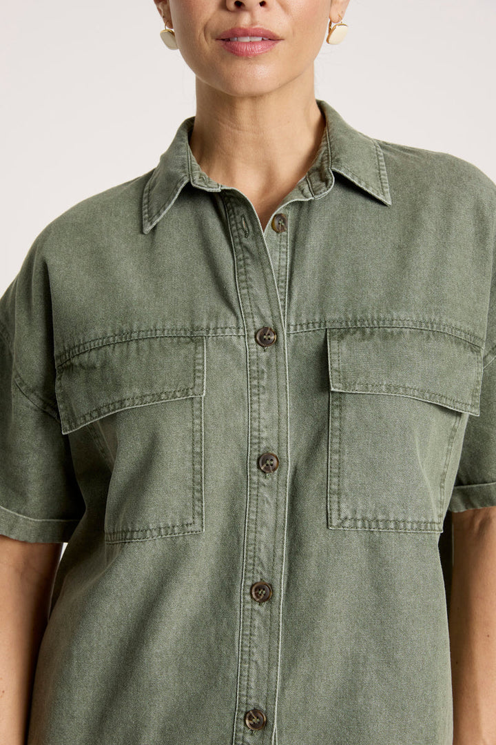 woman wearing Bodhi Denim Shirt in Olive