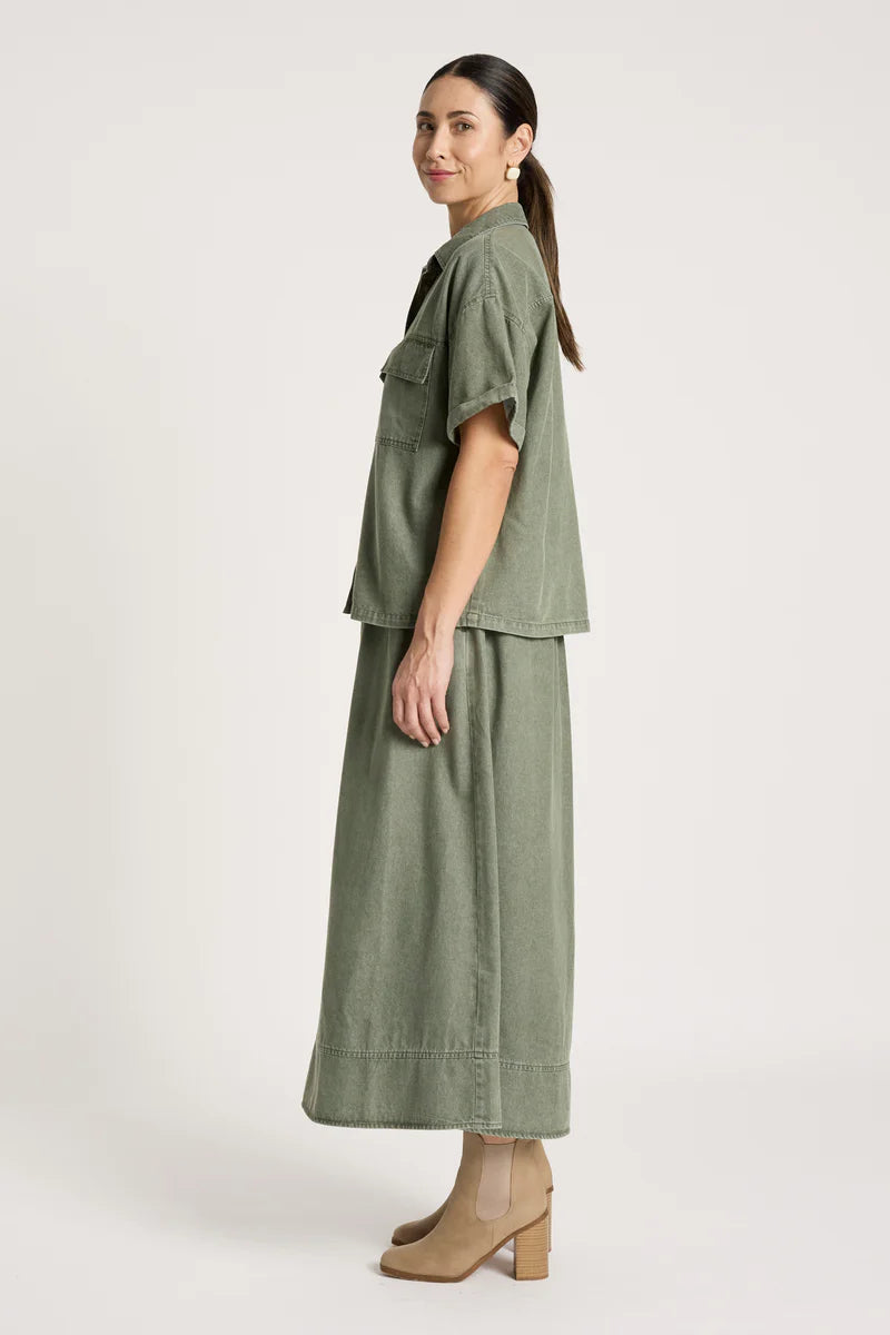 woman wearing Bodhi Denim Shirt in Olive