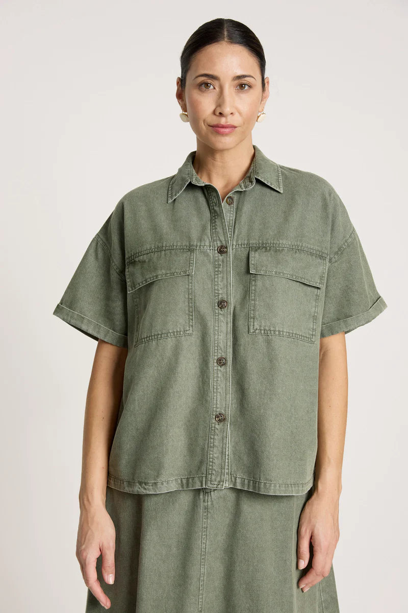 woman wearing Bodhi Denim Shirt in Olive