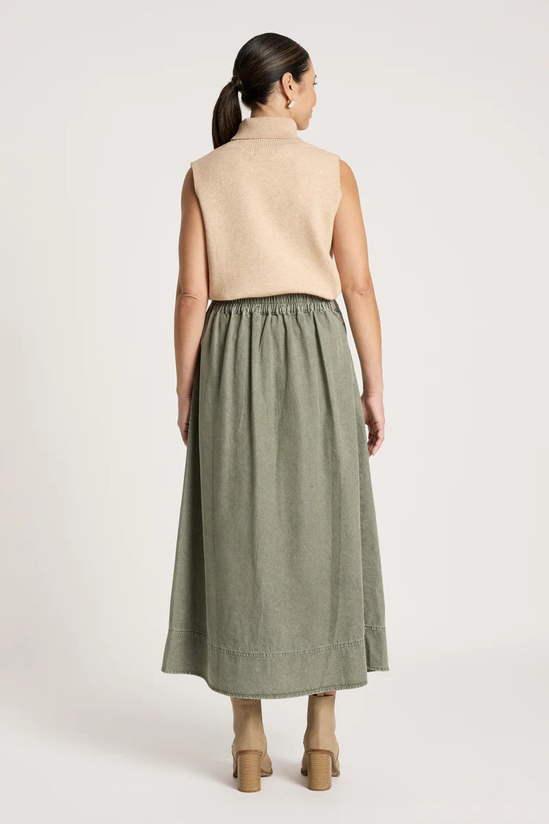woman wearing Bodhi Denim Skirt in Olive
