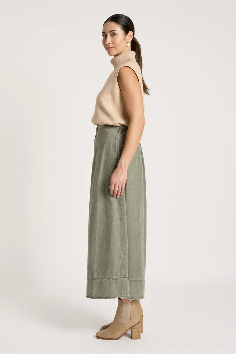 woman wearing Bodhi Denim Skirt in Olive