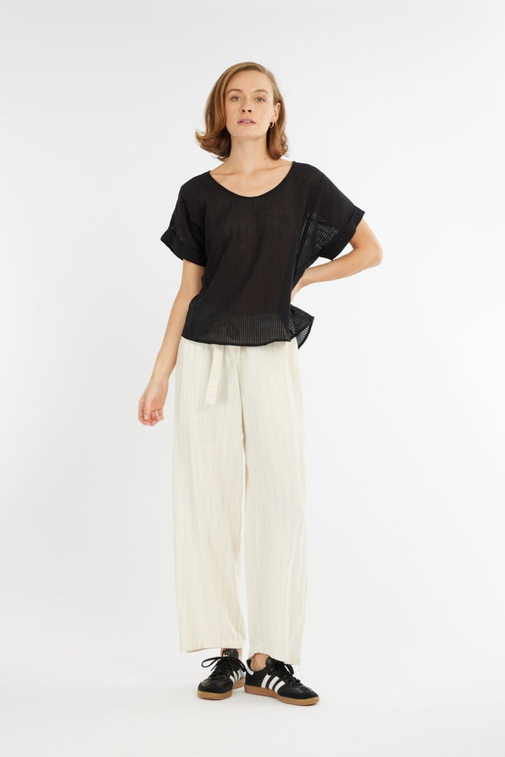 Front view of the Carmen Striped Top in black from Ivy Vibe, featuring a round neckline, short sleeves, and subtle textured stripe pattern on lightweight cotton fabric.