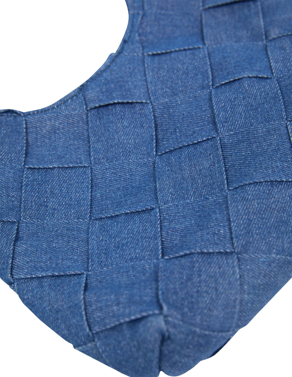 Blue denim vest with woven pattern on a white background