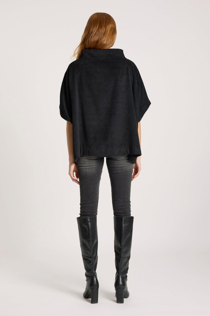 Woman wearing Azul Poncho in Black