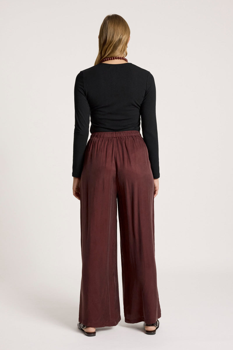 woman wearing Calista Pant in Mahogany