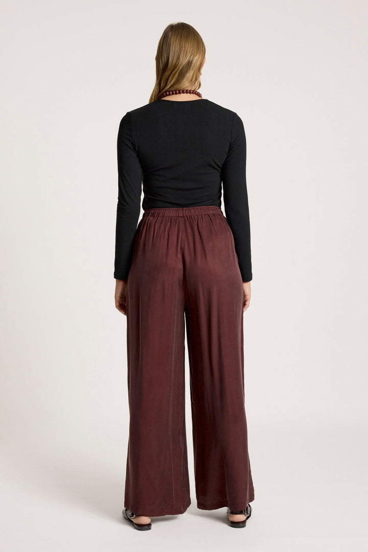 woman wearing Calista Pant in Mahogany