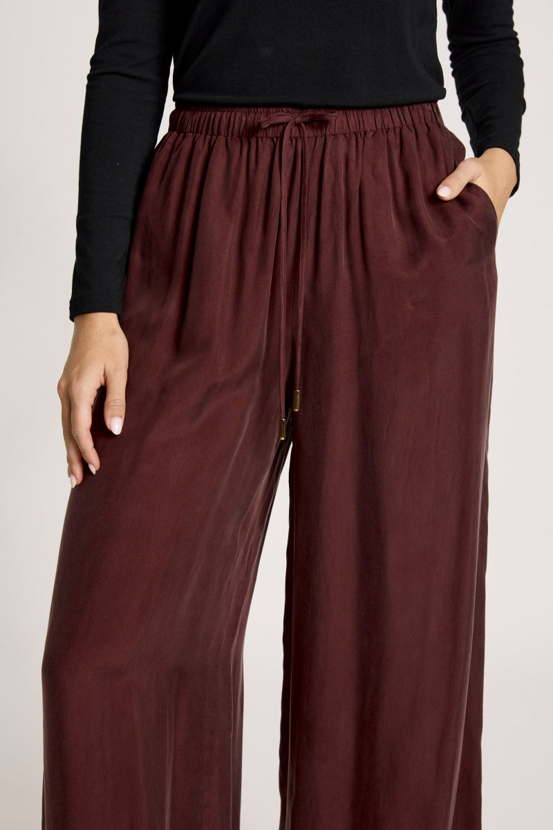 woman wearing Calista Pant in Mahogany