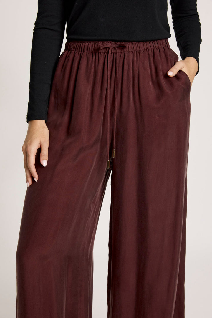 woman wearing Calista Pant in Mahogany