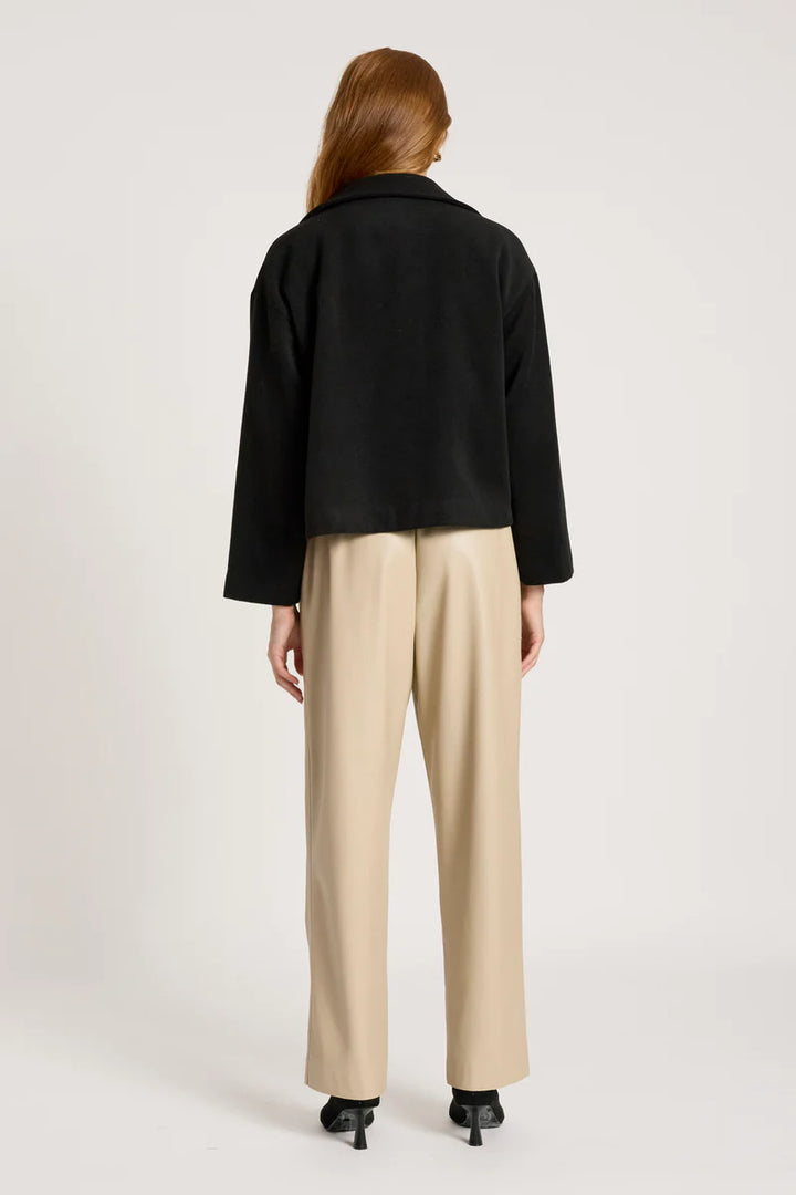 woman wearing Wanderer Crop Jacket in Black