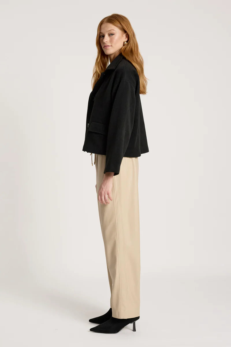 woman wearing Wanderer Crop Jacket in Black