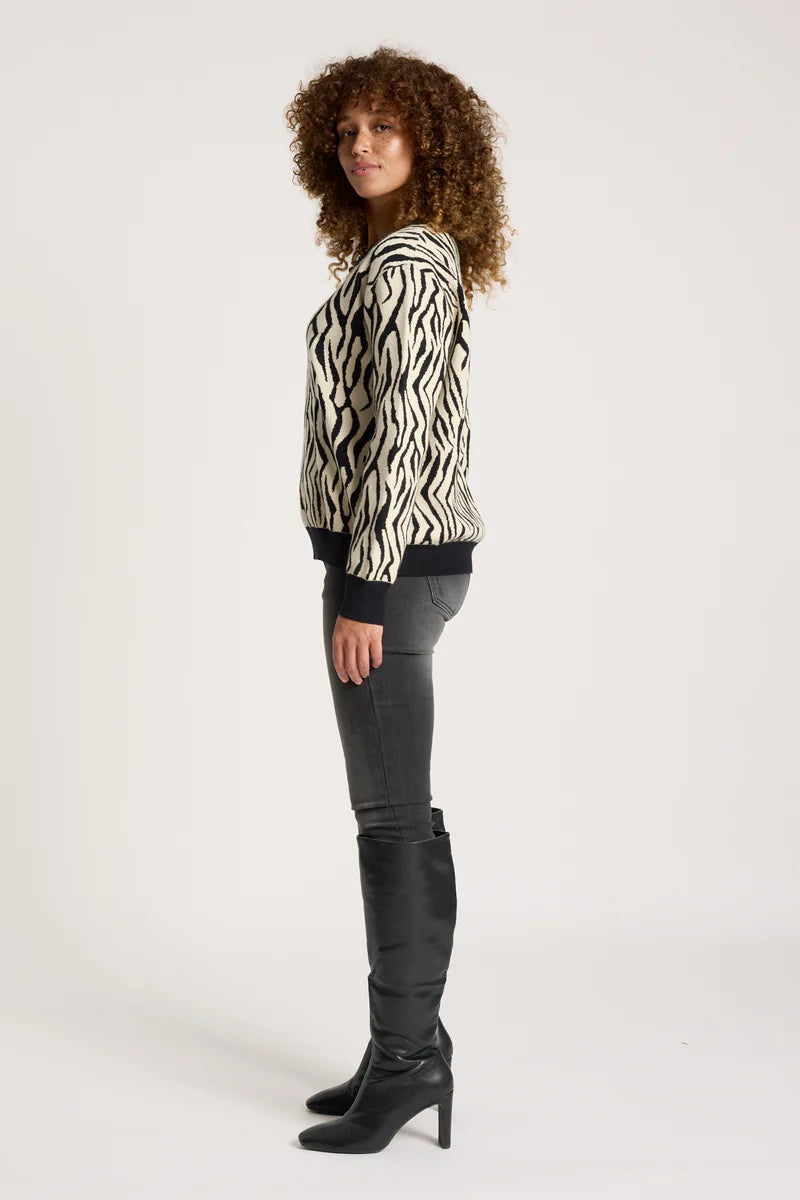 woman wearing Zala Jumper in Savanna