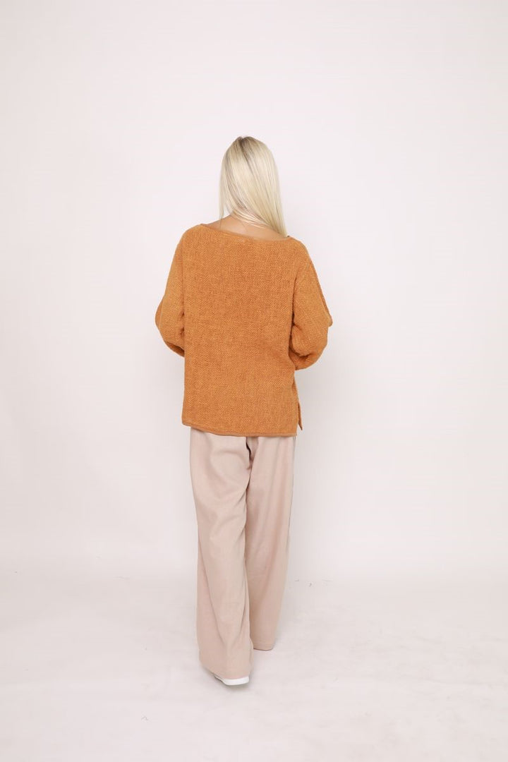 Back view of the Elena Top in Bran, displayed at Ivy Vibe, featuring a relaxed oversized fit and textured handwoven cotton hessian fabric with long sleeves.