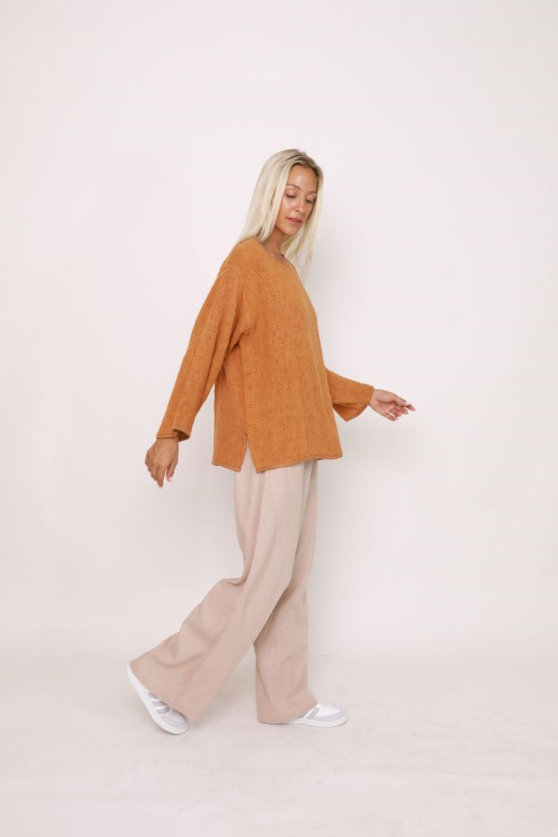 Side view of the Elena Top in Bran, showcased at Ivy Vibe, highlighting its relaxed oversized fit and textured handwoven cotton hessian fabric.
