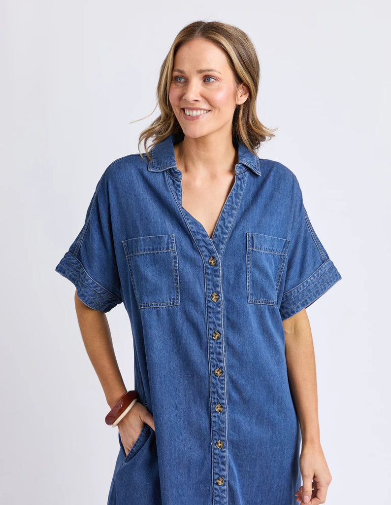 blue ivy denim dress Elm Demi | Vibe Boutique 1499 STORE Hips 33 wearing a Angela Black Velvet Burnout Color:Cream Blue Orange