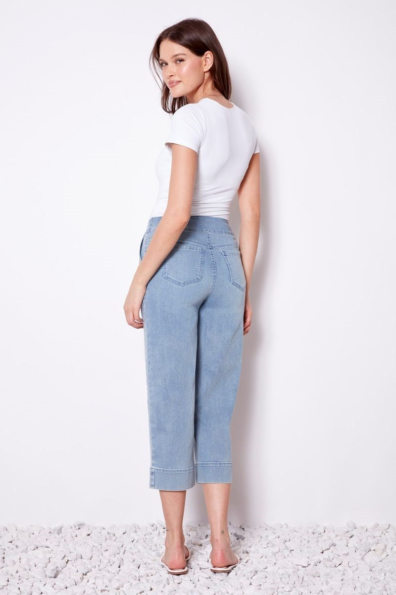 Back view of the Gaucho Denim Pant in light blue from Ivy Vibe Boutique, highlighting the wide-leg design and relaxed denim fit.