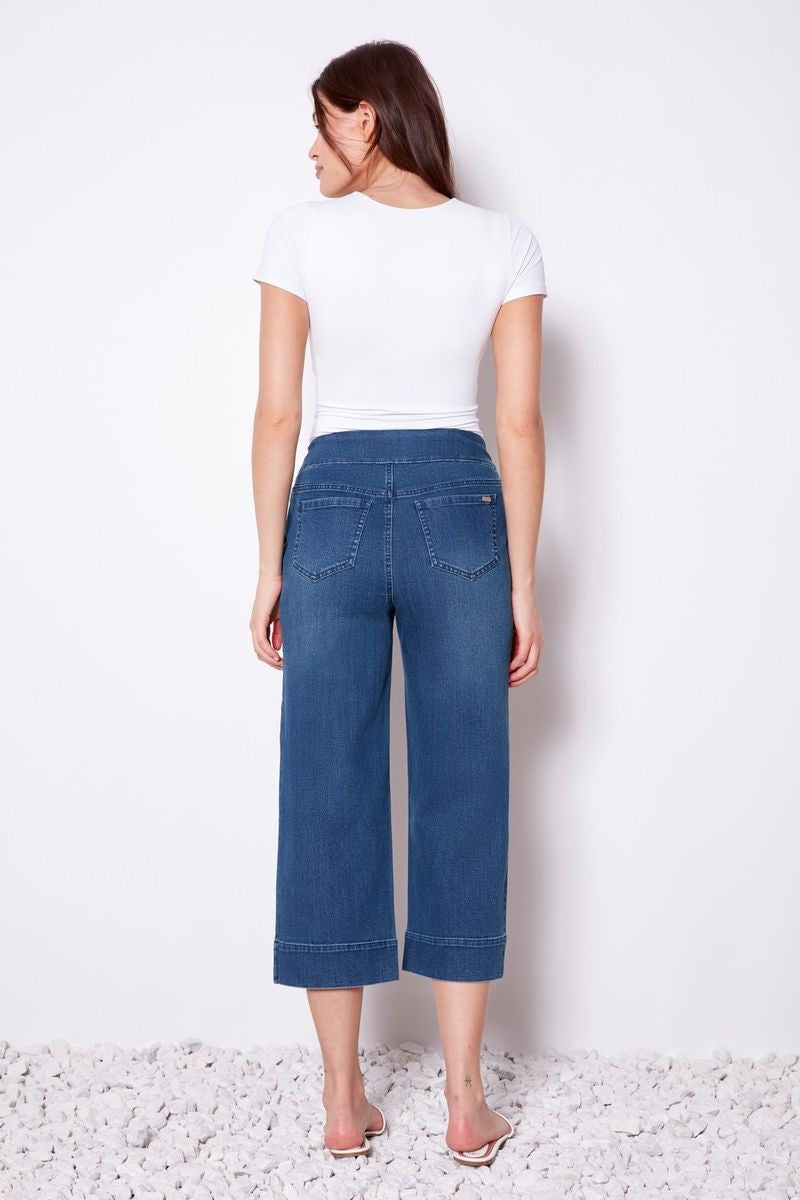 Back view of the Gaucho Denim Pant in medium blue from Ivy Vibe Boutique, showcasing the wide-leg cut and relaxed denim fit.