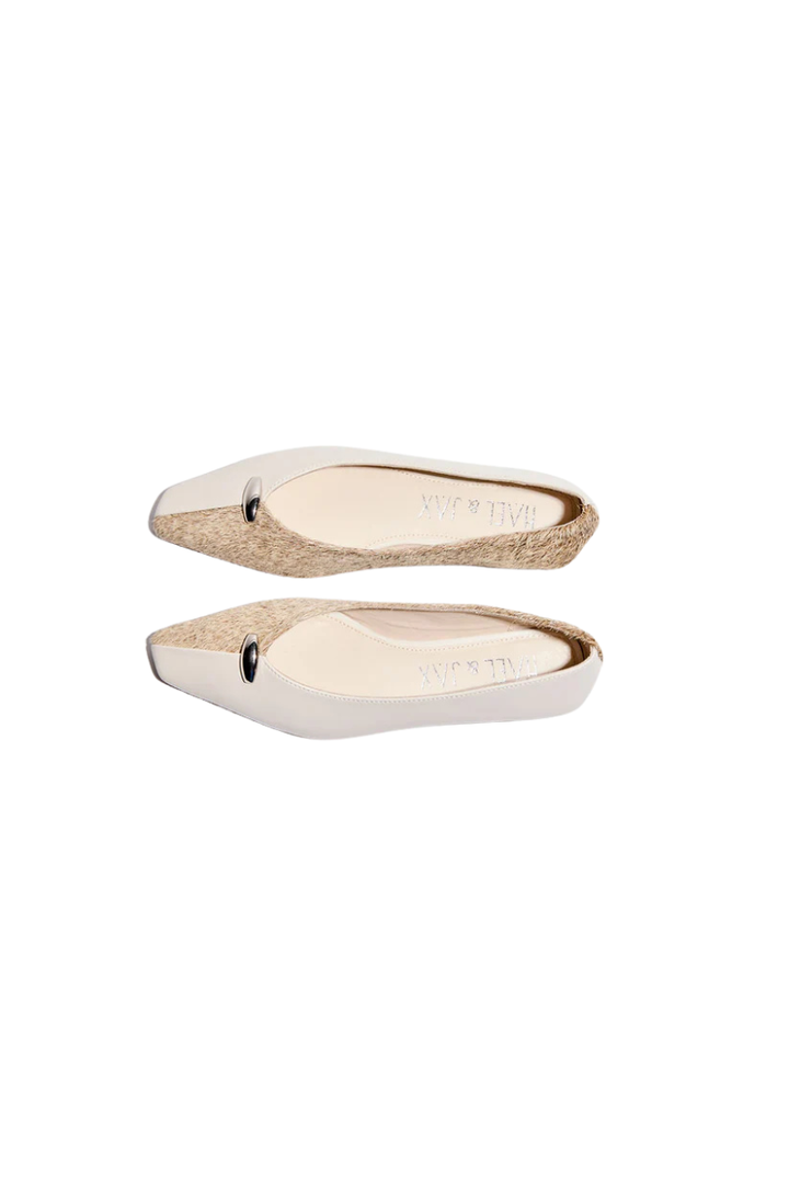 Pair of beige flat sandals with jute sole on a white background