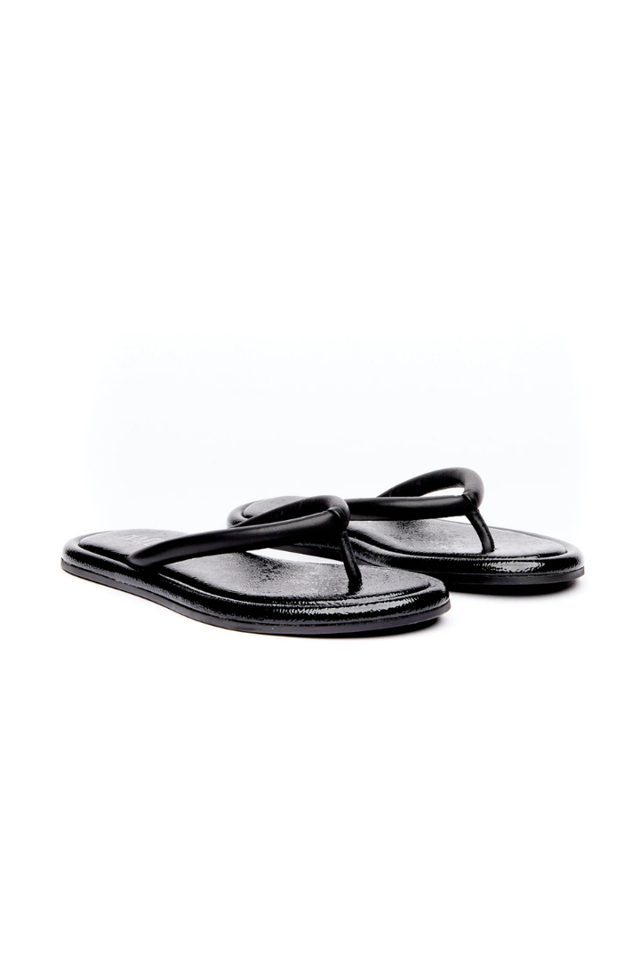 A pair of black thong sandals with a glossy finish, displayed on a clean white background.