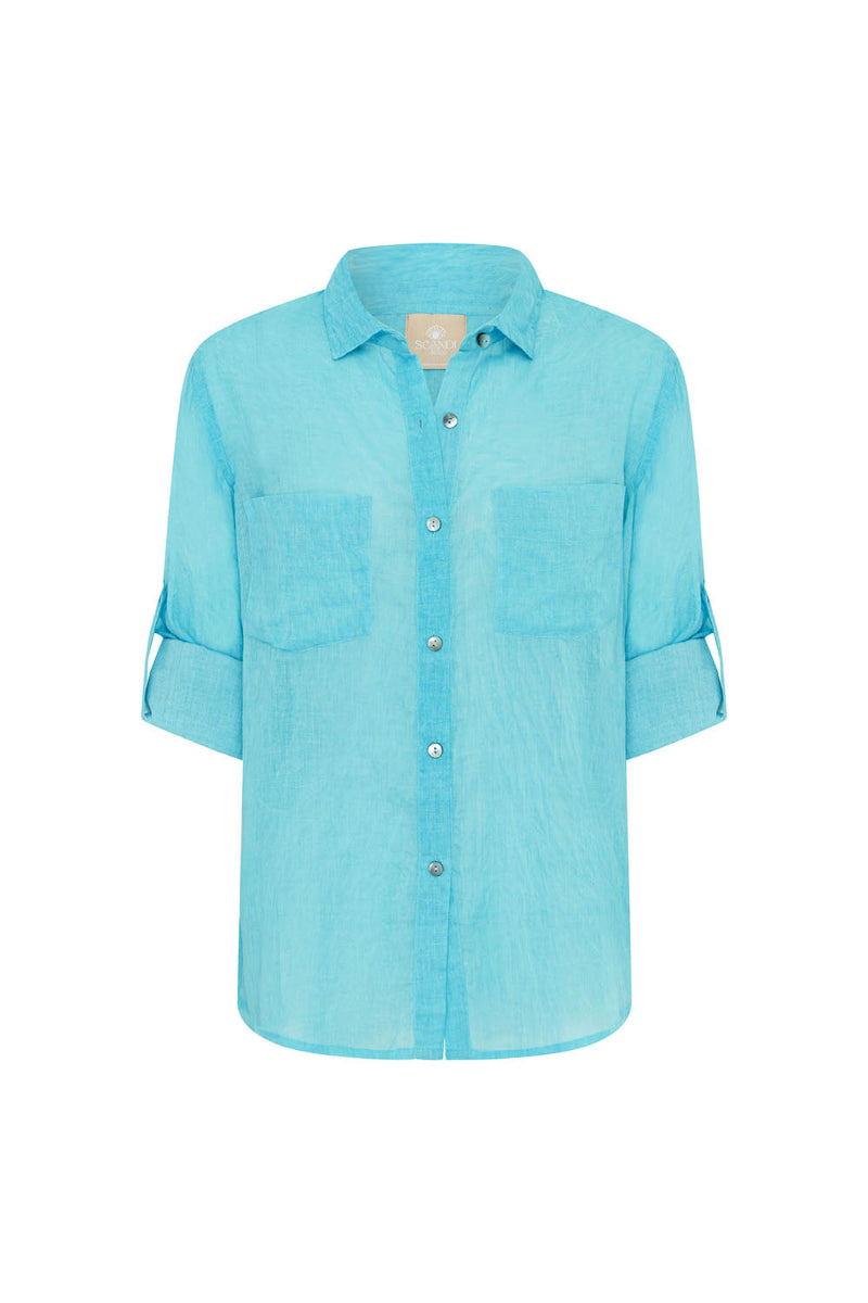 Light blue button-up shirt featuring roll-tab sleeves and twin chest pockets on a white background