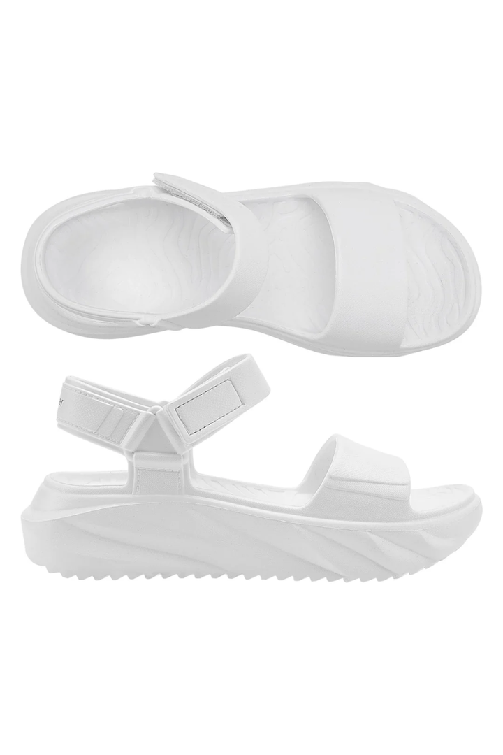 White sandals on a white background