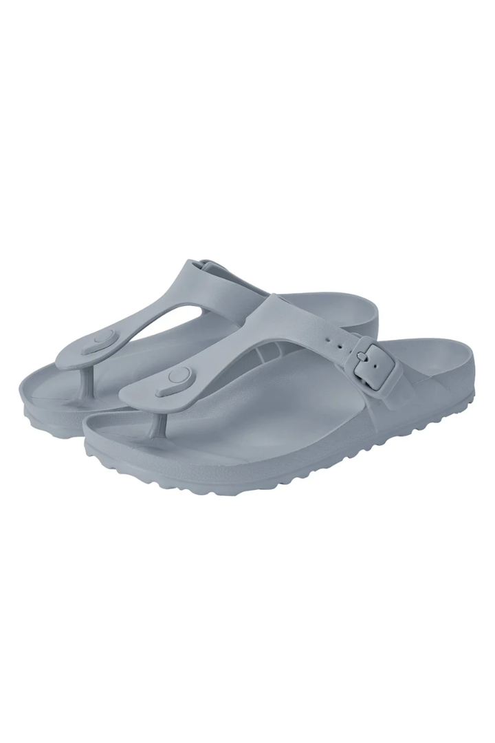 Pair of gray sandals on a white background