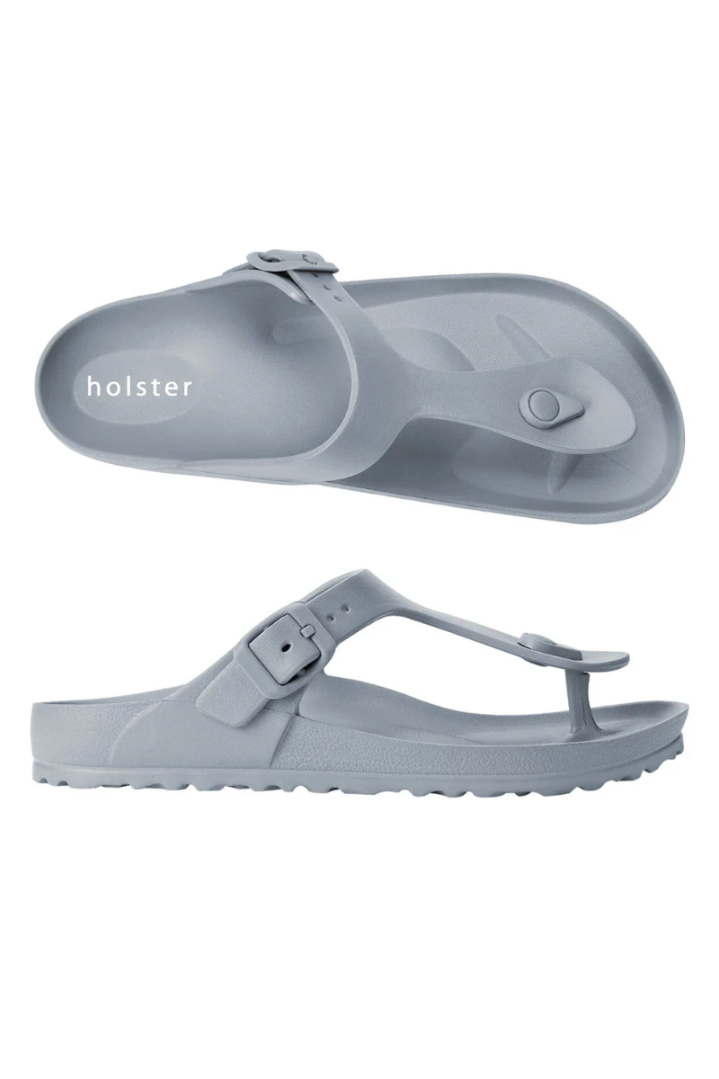 Gray sandals with 'holster' branding on a white background
