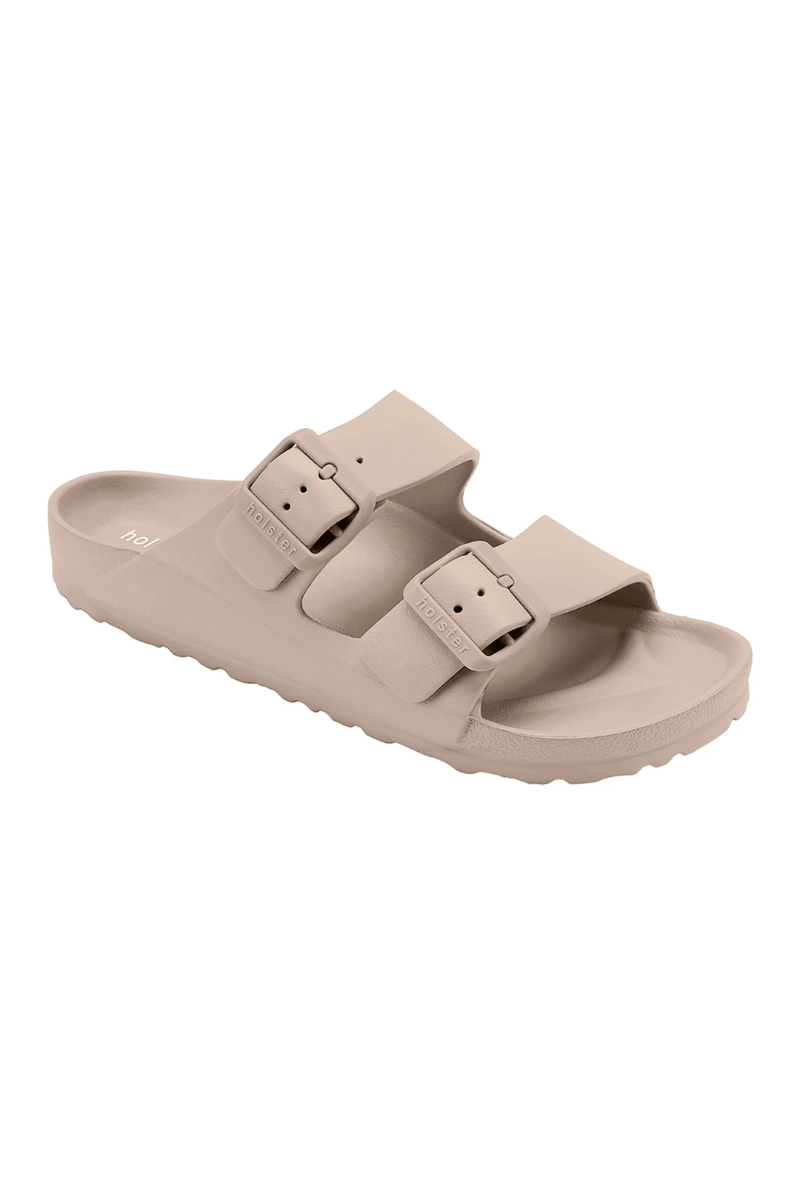 Beige sandal with two straps on a white background