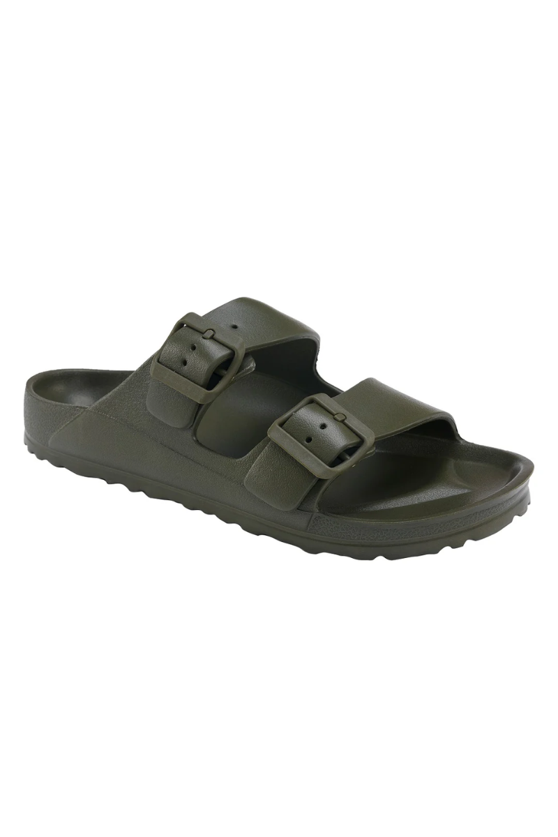 Green sandal with double straps on a white background