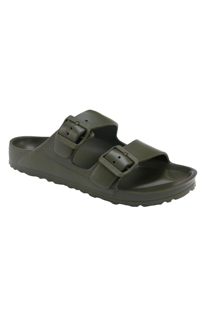 Green sandal with double straps on a white background